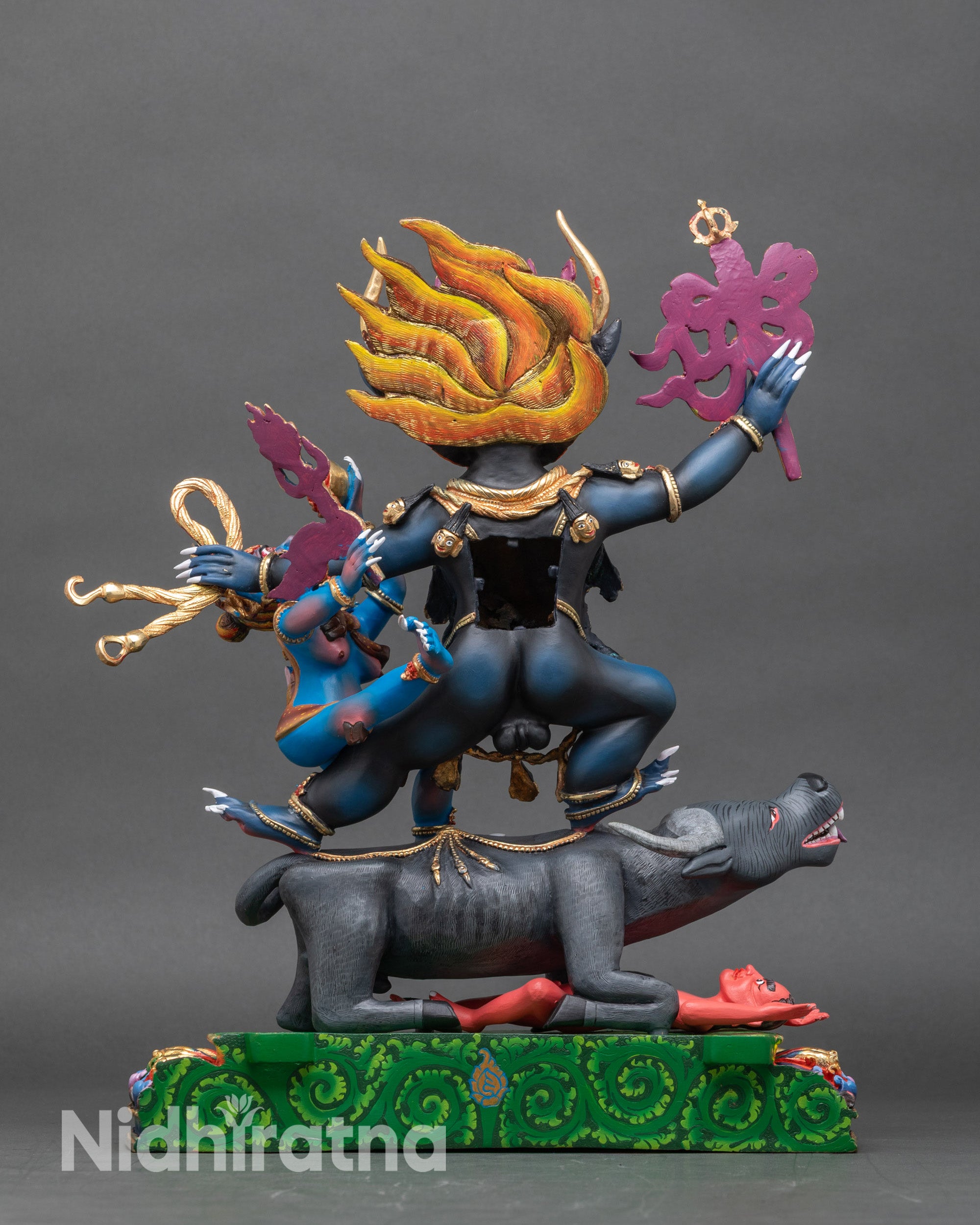Back of Yamantaka Vajrabhairava statue with lotus seat and consort in yab-yum position