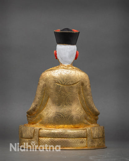 Back view 1st Karmapa Dusum Khyenpa statue monk robe carving Himalayan art