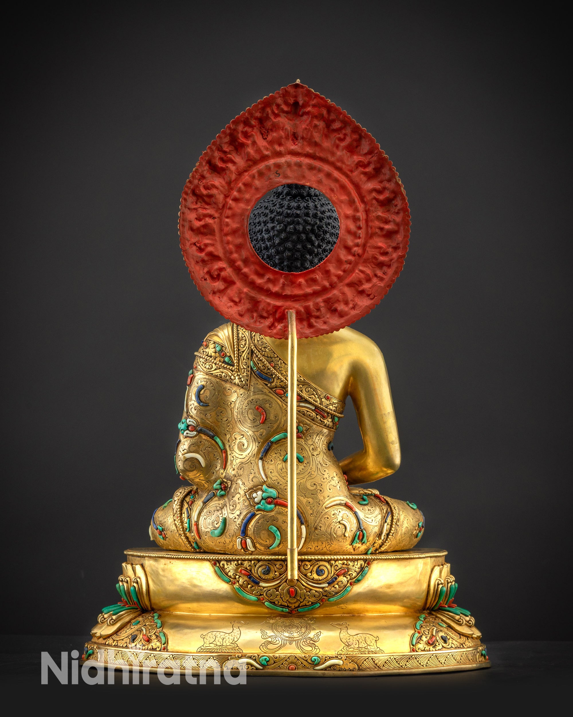Back view Amitabha Buddha Statue, detailed robe and halo on lotus throne
