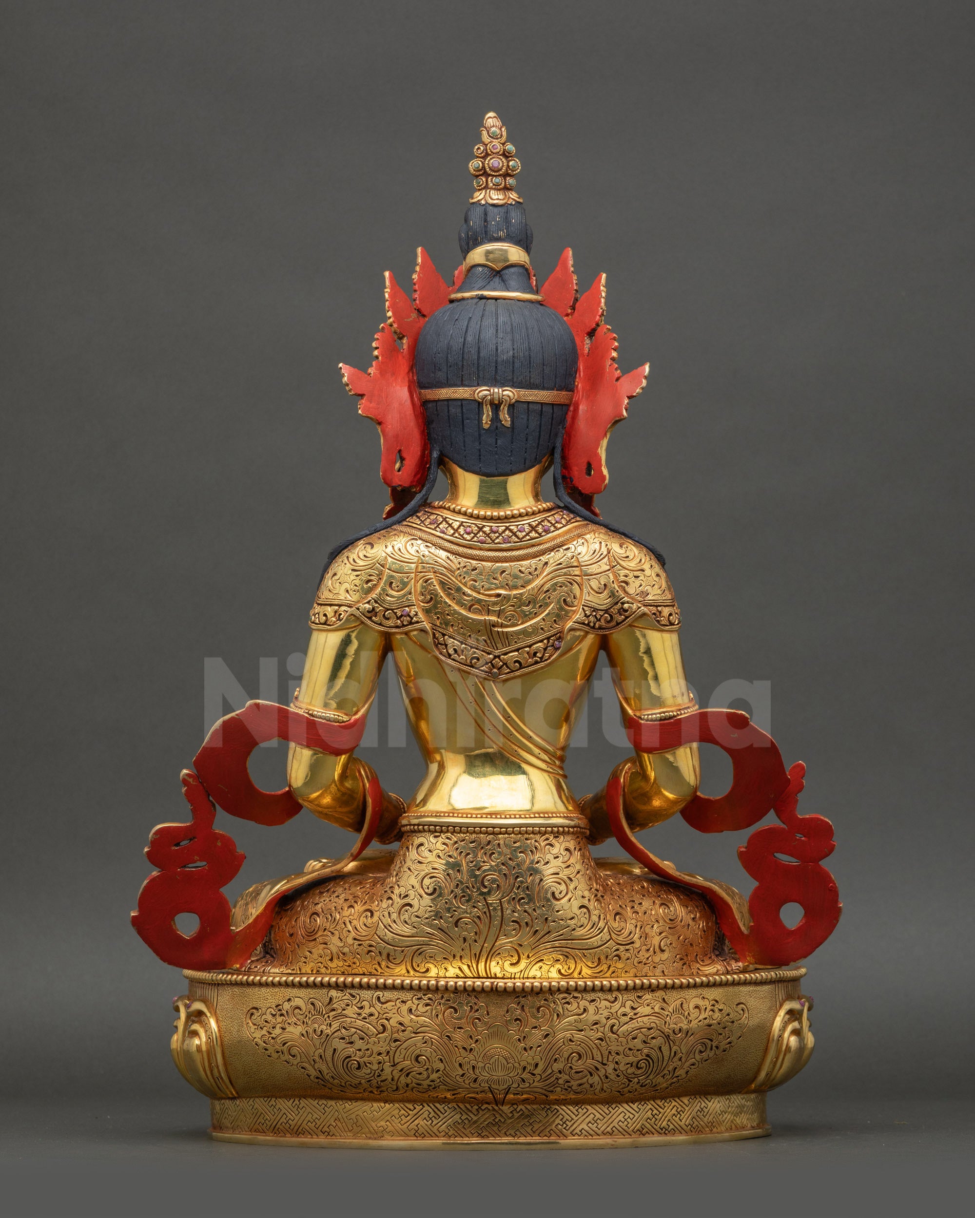 Back view Amitayus Buddha statue showing carved robes and detailed pedestal artwork
