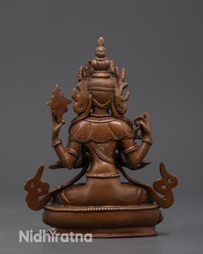 Back view Avalokiteshvara Statue showing flowing carved garments and armlets