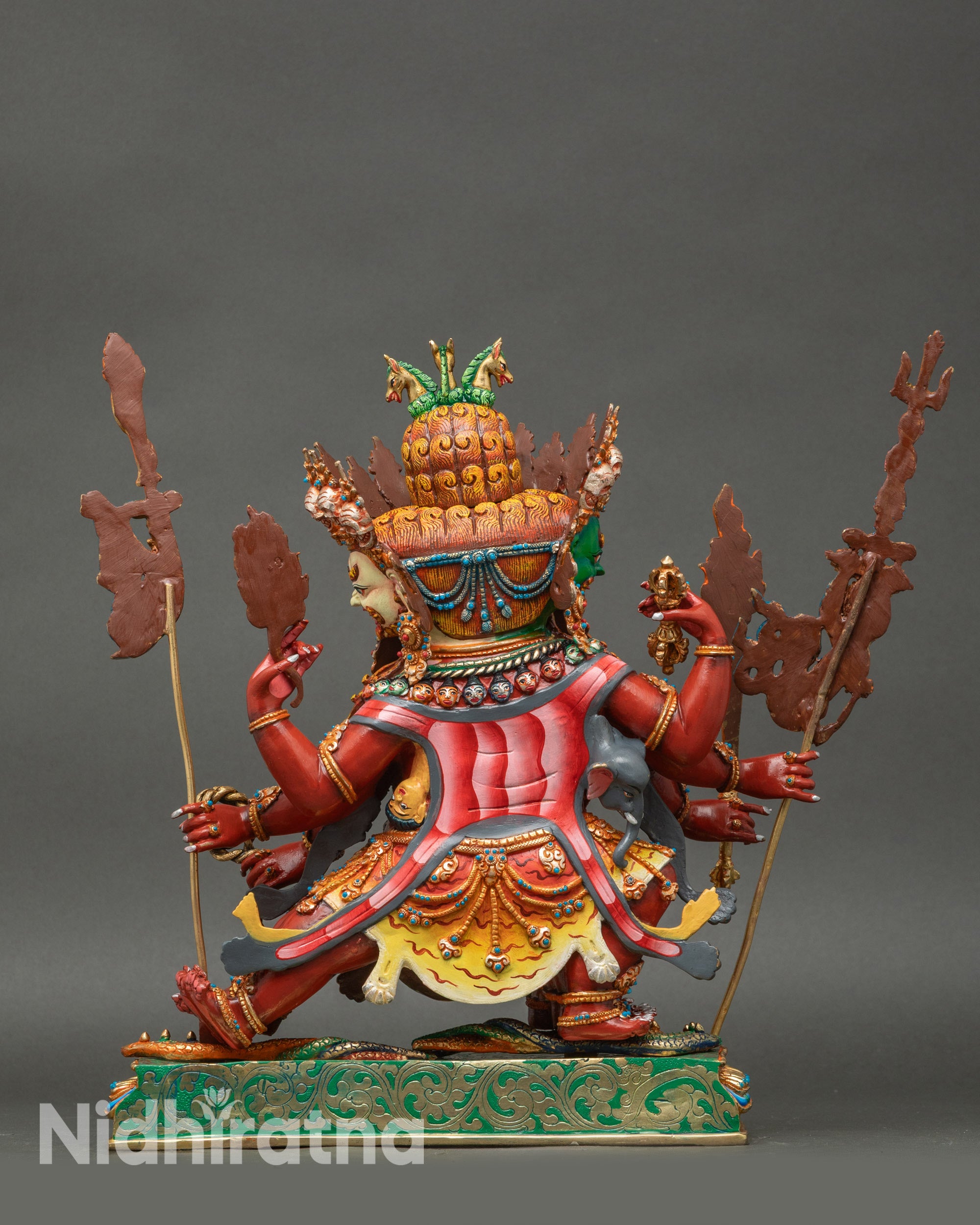 Back view: Back view of Hayagriva statue showing engraved details on lotus base