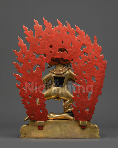 Back view Black Dzambhala Statue showing robe details and fire-gilded body