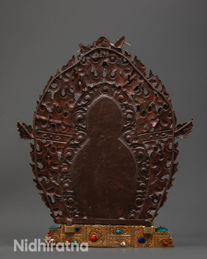 Back view Black Dzambhala featuring wrathful flame halo, deities, and lotus offerings