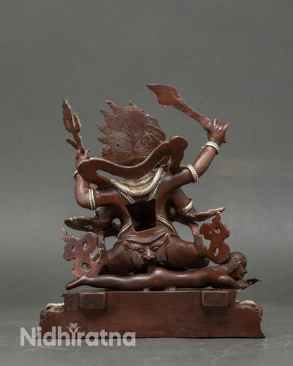 Back view Chaturbhuja Mahakala sculpture showing intricate robes and Nepalese craftsmanship