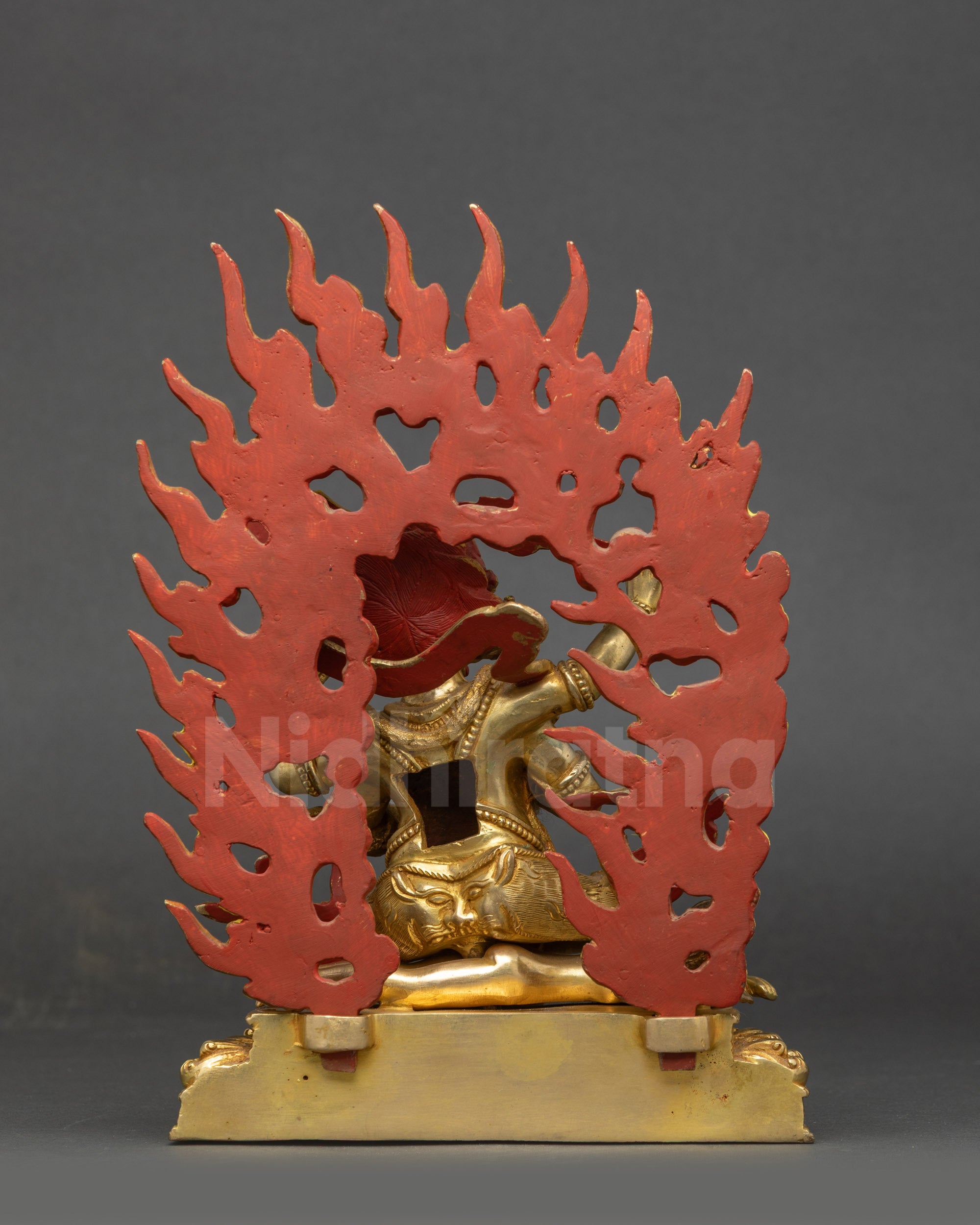 Back view Chaturbhuja Mahakala statue lotus base blazing wisdom flame halo