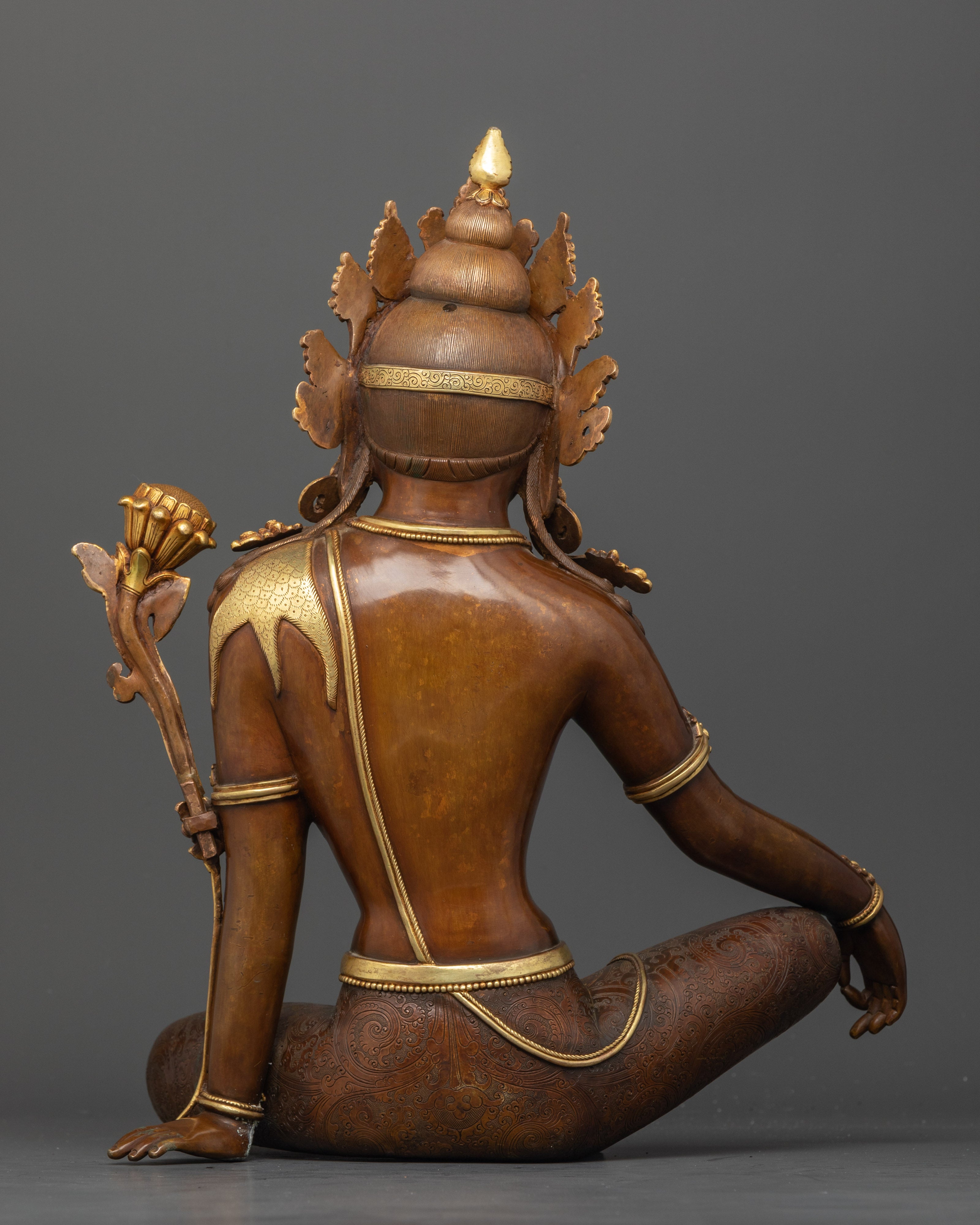 Back view Chenrezig oxidized copper statue gold jewelry intricate Himalayan craftsmanship