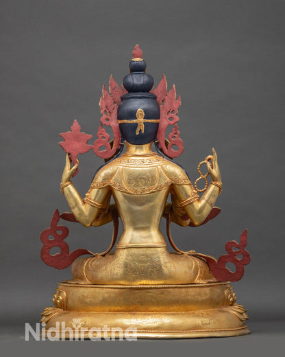 Back view Chenrezig statue, handmade Nepalese Buddhist sculpture with flowing robes