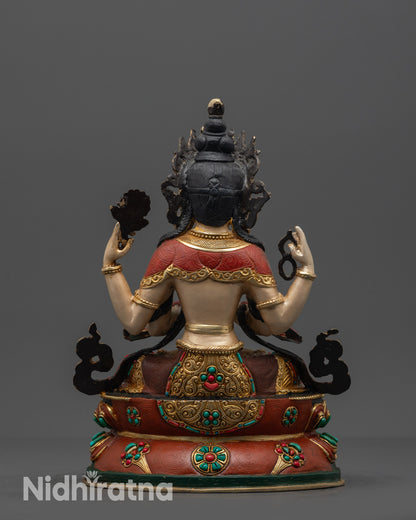 Back view Chenrezig statue on colored and gold-plated lotus with detailed carvings