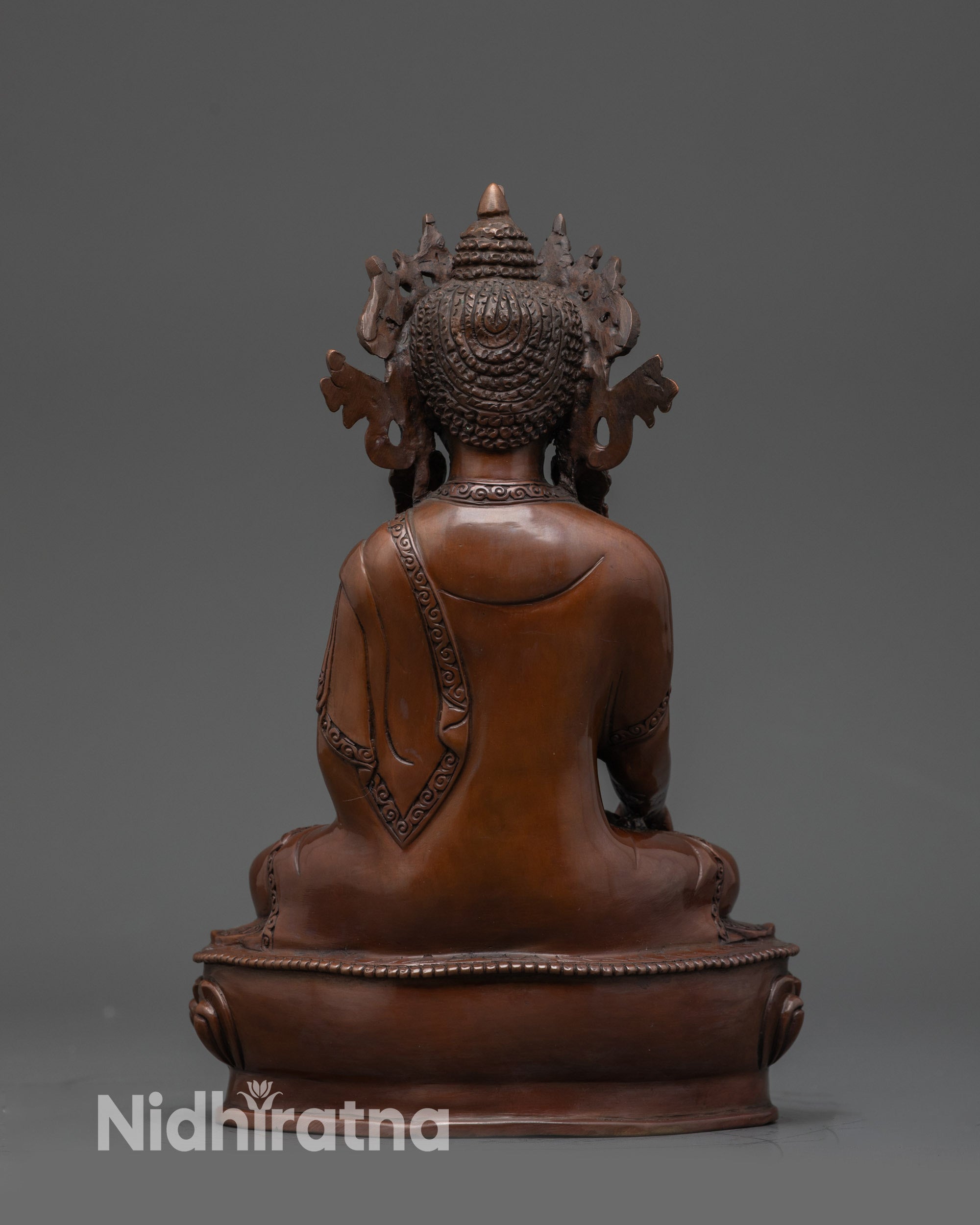 handcrafted oxidized copper Buddha statue