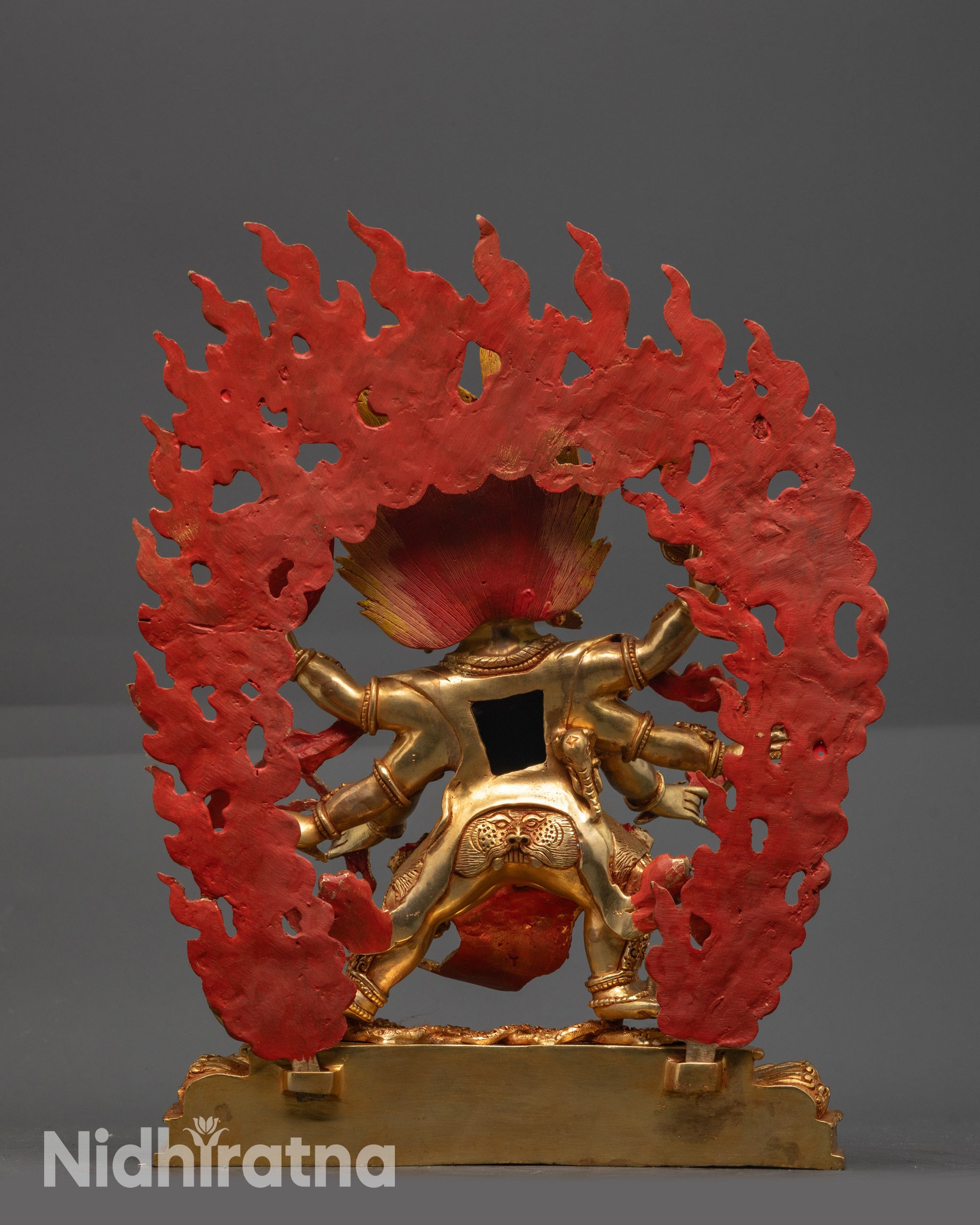 Back view Dharmapala Statue with blazing halo and lotus base symbolizing purity and protection