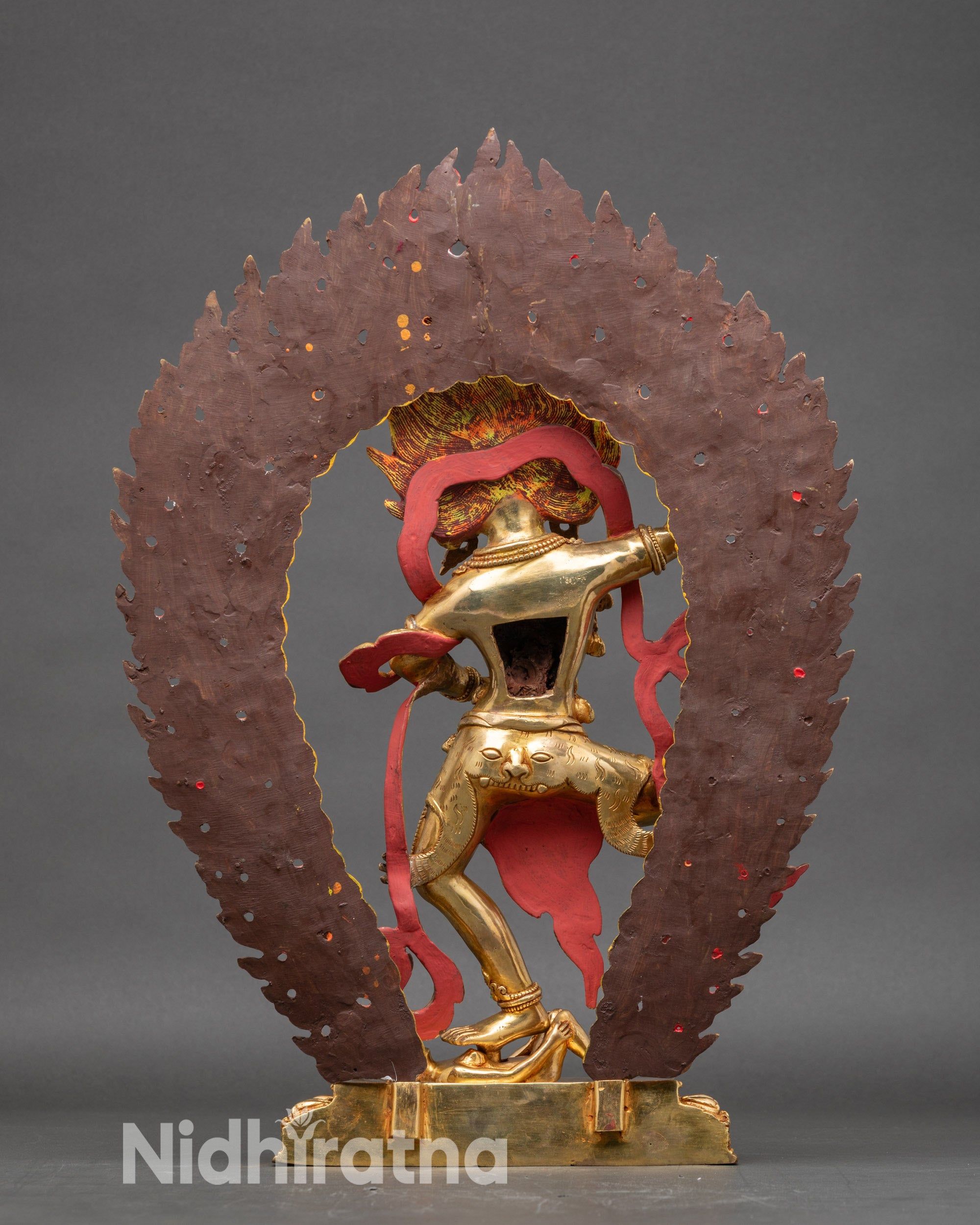 Back view Dorje Phagmo standing on lotus seat with blazing halo and intricate carvings