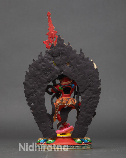 Back view Dorje Phagmo statue blazing halo stepping on evil spirit Nepalese art