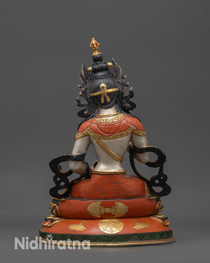 Back view Dorje Sempa statue on lotus seat showing dharma wheel and deer carvings in detail