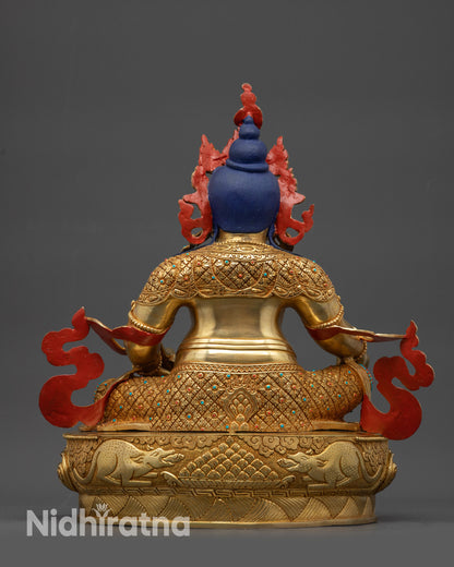 Back view Dzambhala Statue showing carved patterns and gold fire-gilded base