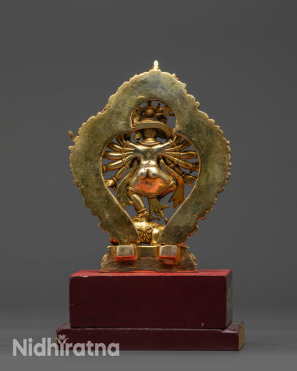 Back view Ganesh statue showing lotus seat, robes, and wooden base