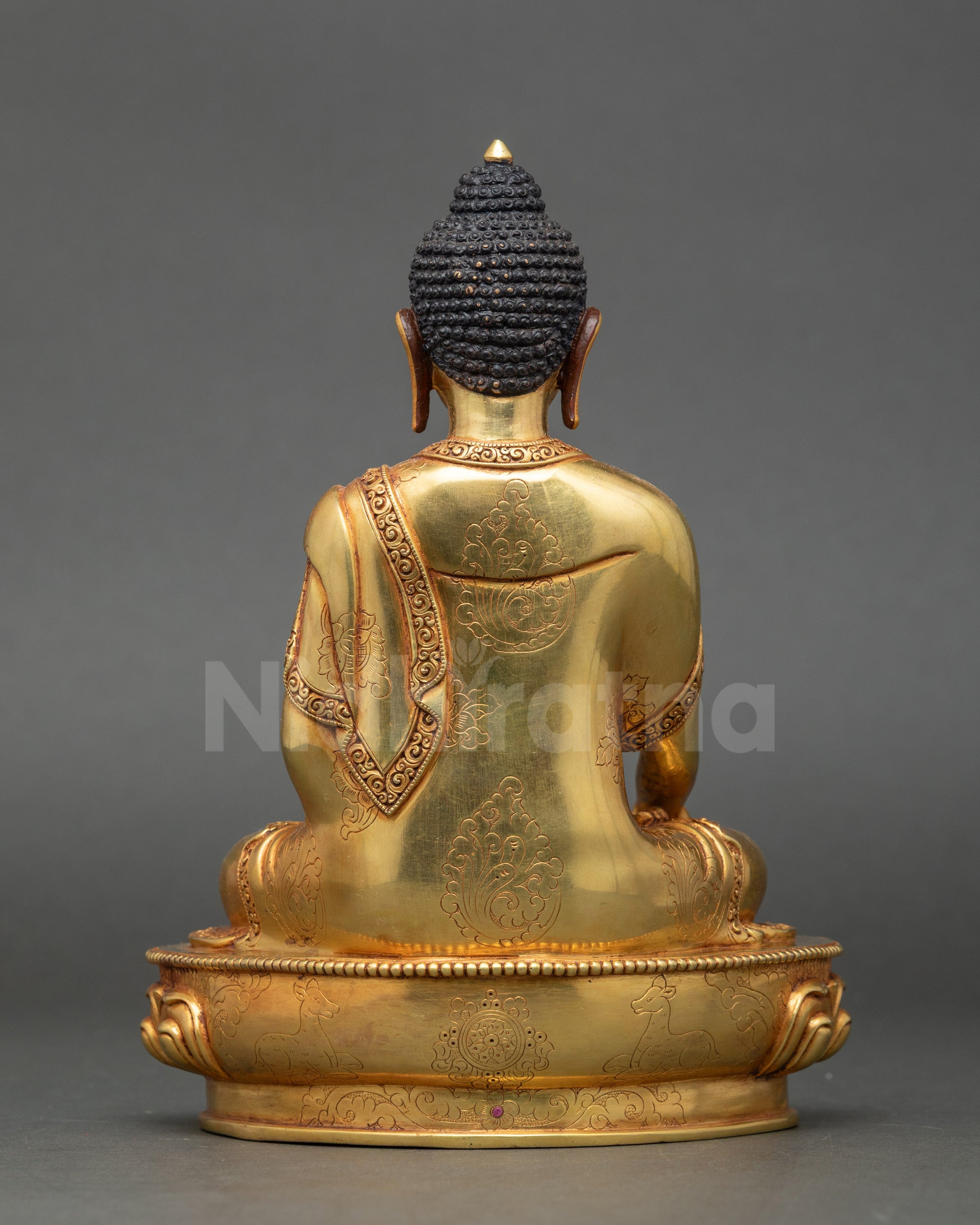 Back view Gautama Shakyamuni Buddha statue gold-gilded copper detailed robe design Nepal
