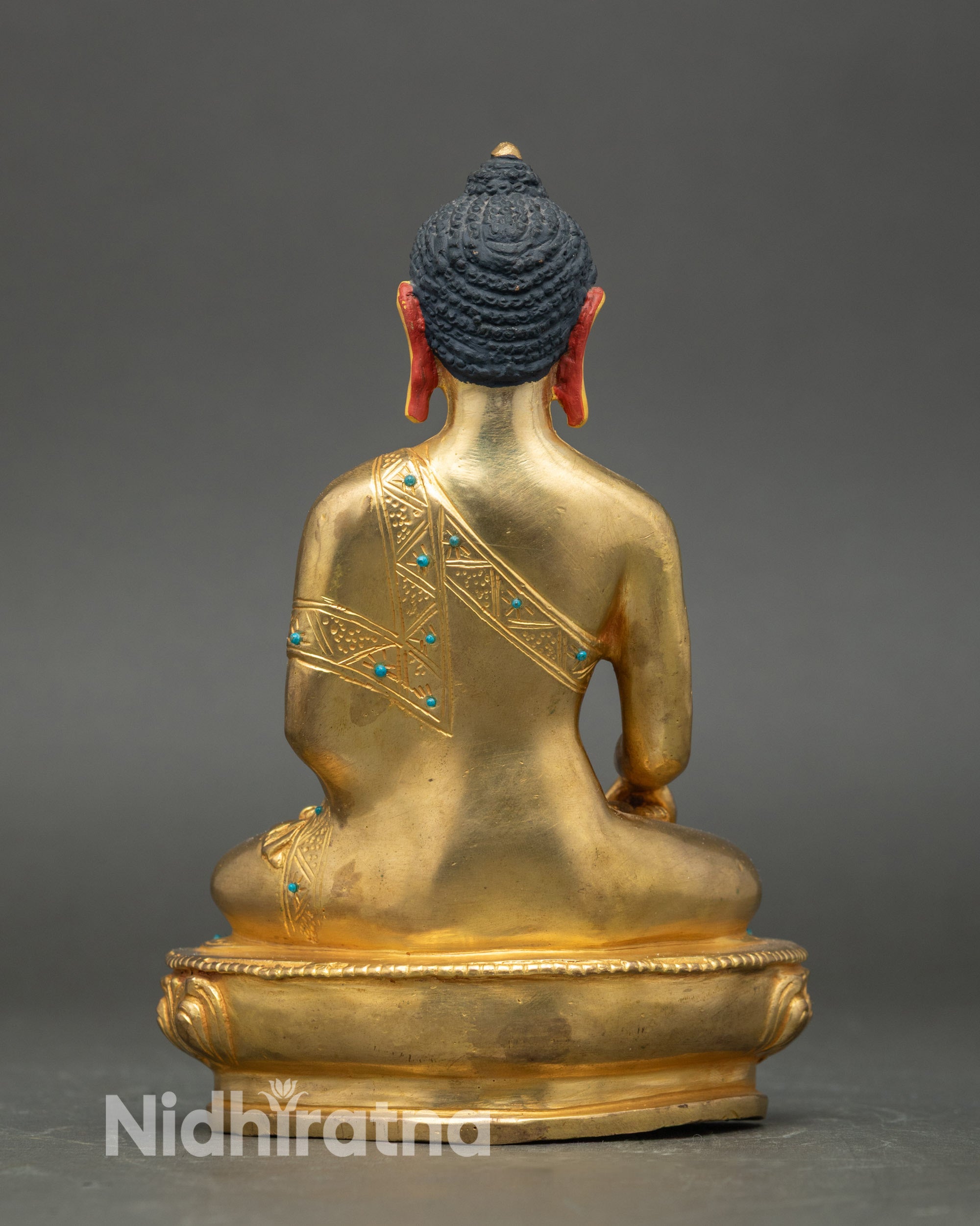 Back view – Gold-detailed Shakyamuni Buddha back, lotus pedestal, Himalayan metal artistry