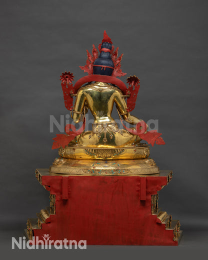 Back view Green Tara Statue with multicolored stone inlays and intricate carvings
