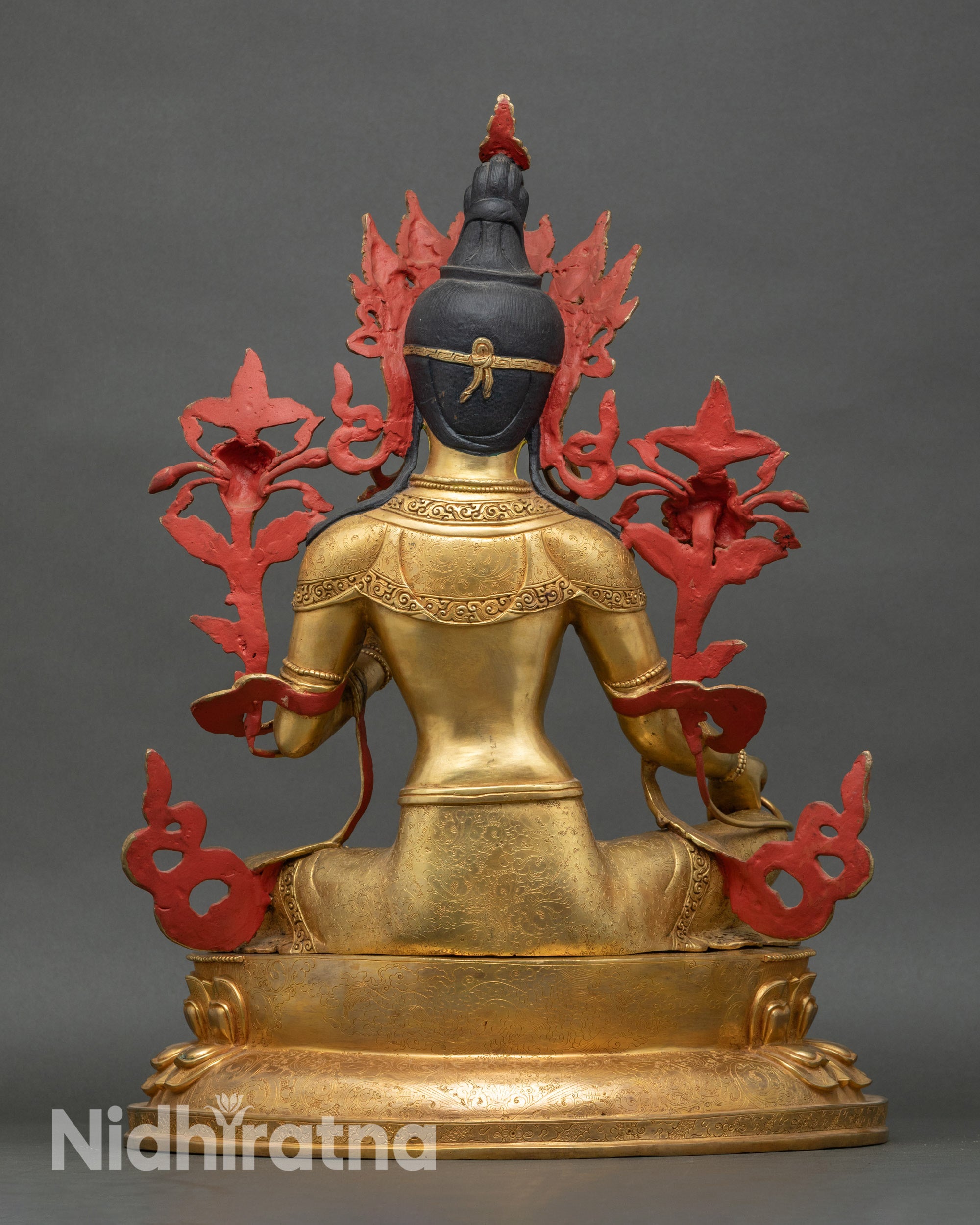 Back view Green Tara sculpture, detailed hand-carved lotus base and golden fire-gilded finish