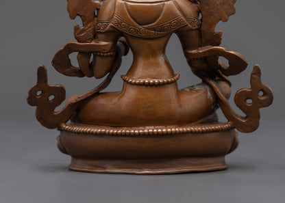 Back view Green Tara seated in royal ease mudra with flowing robe and jeweled lotus seat