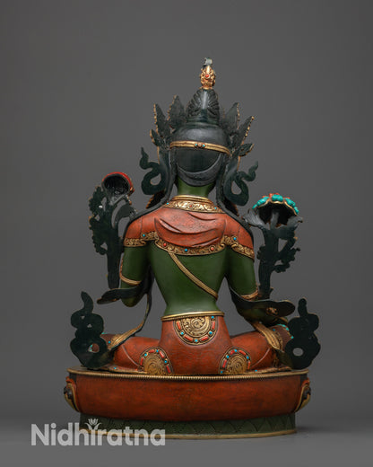 Back view Green Tara statue showing gold-plated robe and detailed carvings