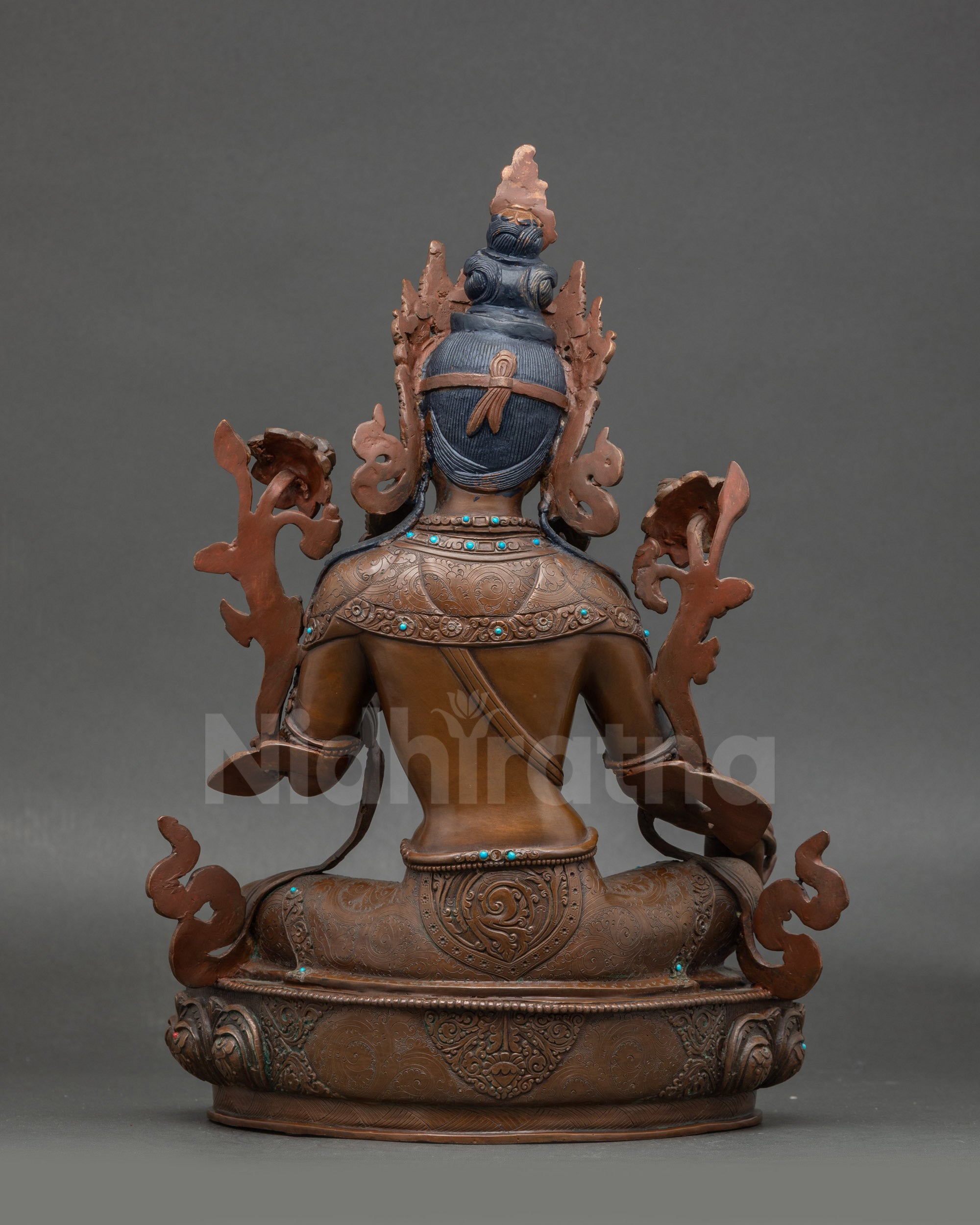 Back view Green Tara statue showing intricate details, handmade Nepalese copper