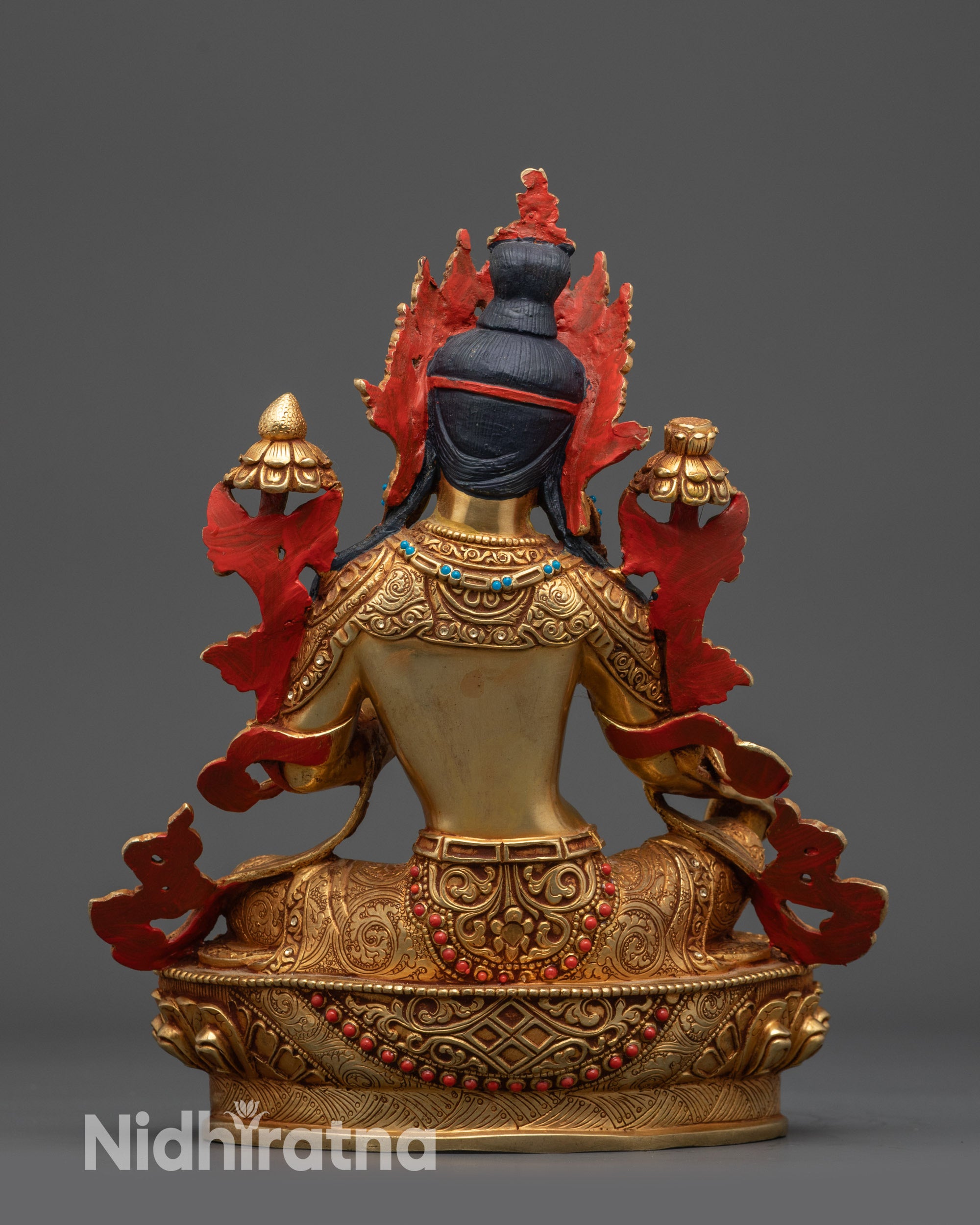 Back view Green Tara statue showing intricate robe patterns and halo detailing