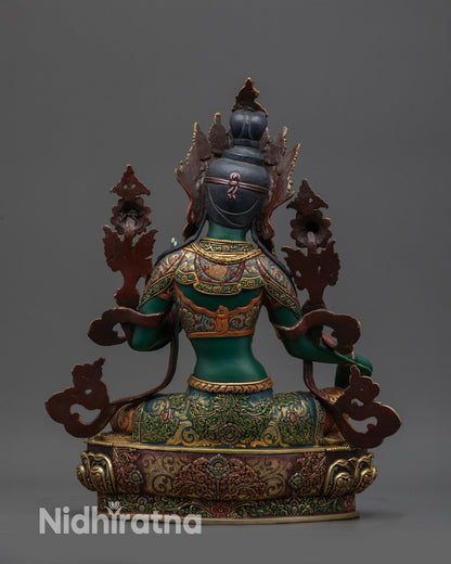 Back view Green Tara statue with carved floating robe and gold-gilded lotus base details
