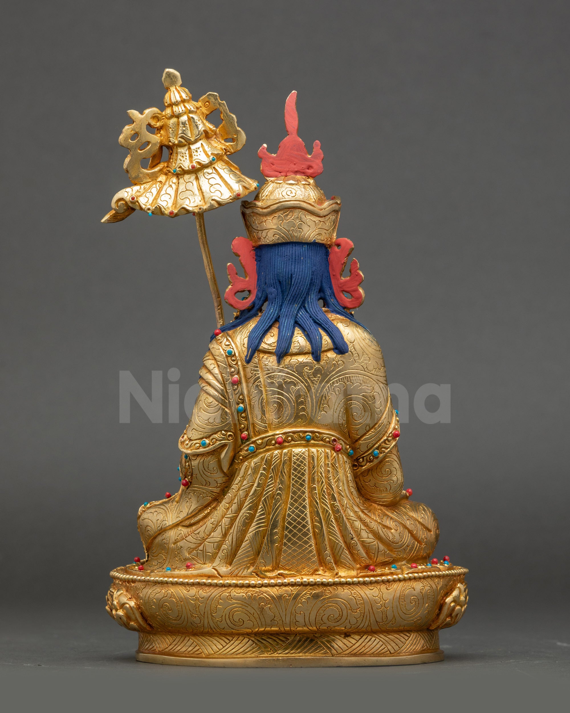 Back view Guru Norlha Statue, handmade Nepalese copper abundance meditation sculpture