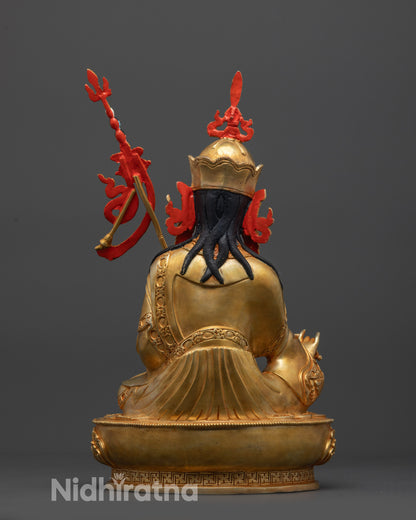 Back view Guru Rinpoche Statue displaying detailed robe carving and lotus seat