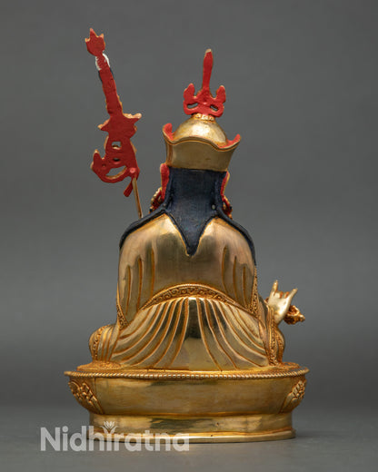 Back viewGuru Rinpocghe copper statue, intricate swirling garments, Nepalese sacred art