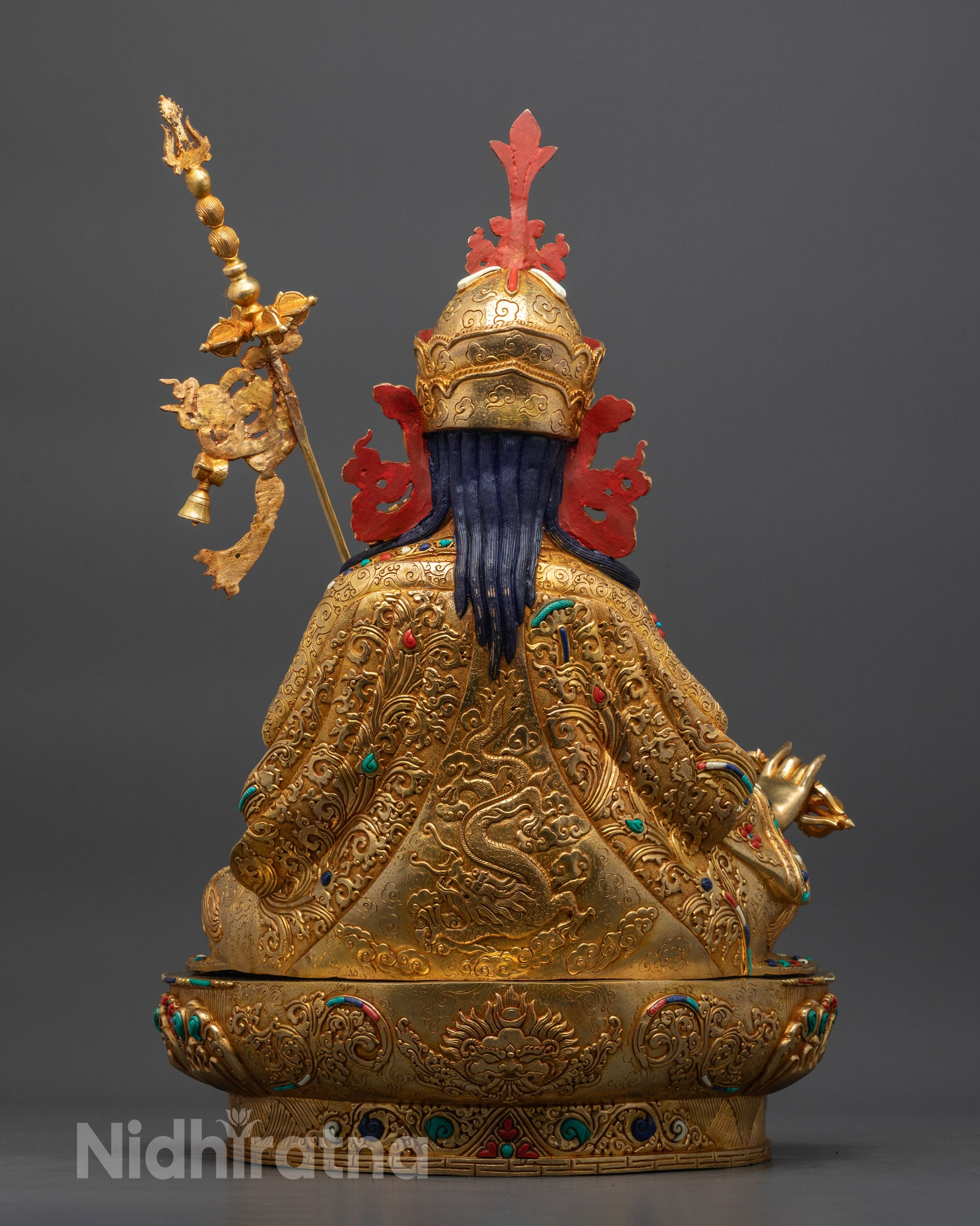 Back view Guru Rinpoche statue lotus hat and dragon head carvings on hand-carved seat
