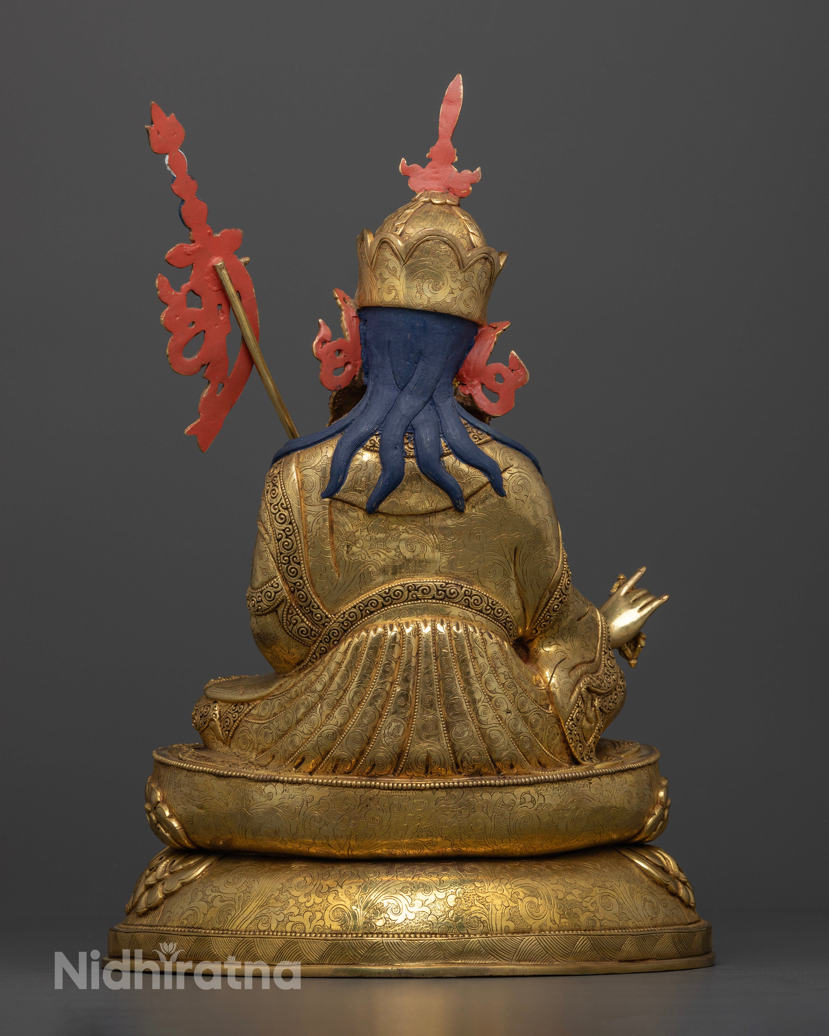Back view Guru Rinpoche statue with detailed lotus pedestal and flowing garments, traditional handcrafted Himalayan art