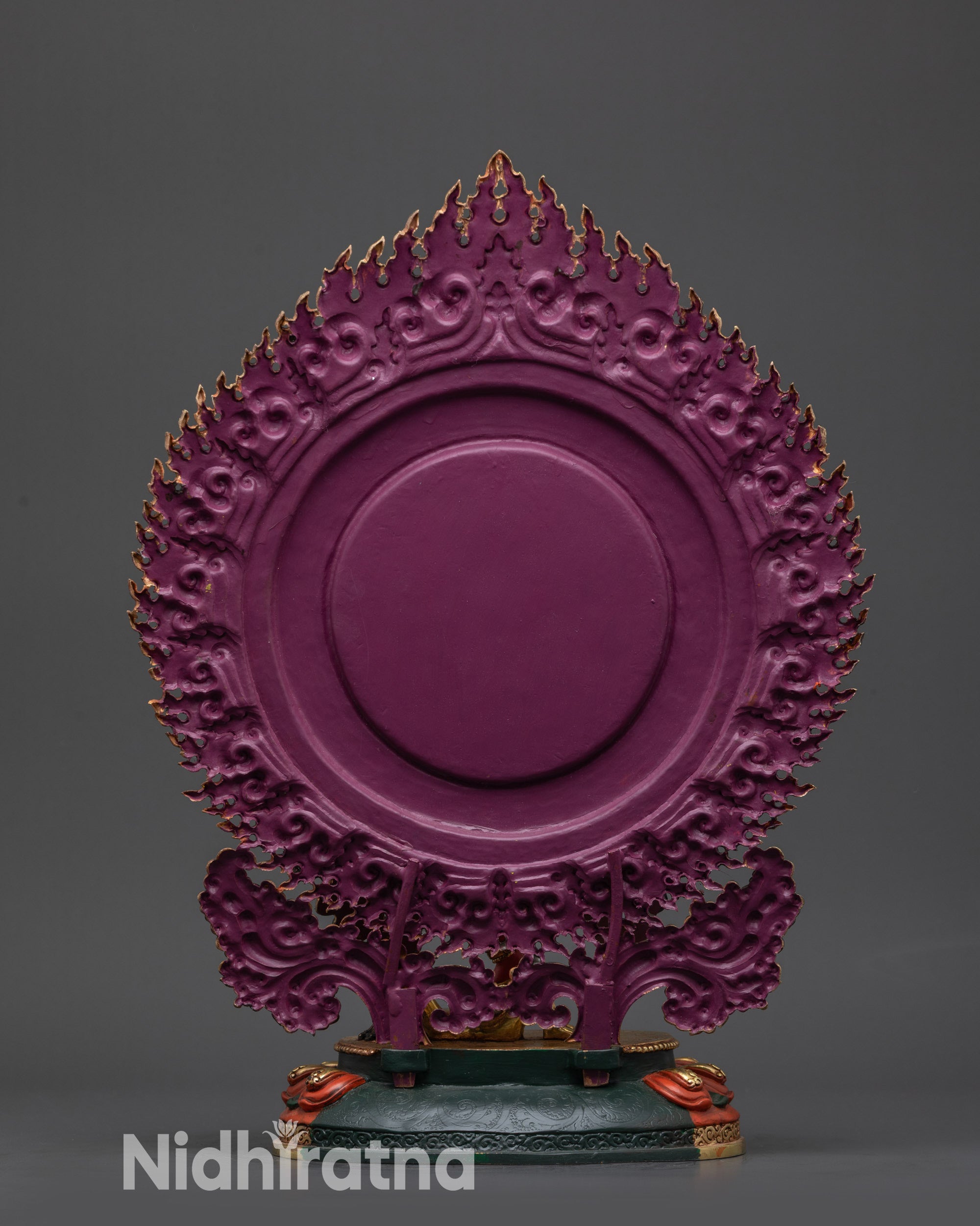 Back view Kurukulla Statue displaying subdued human figures and detailed halo design