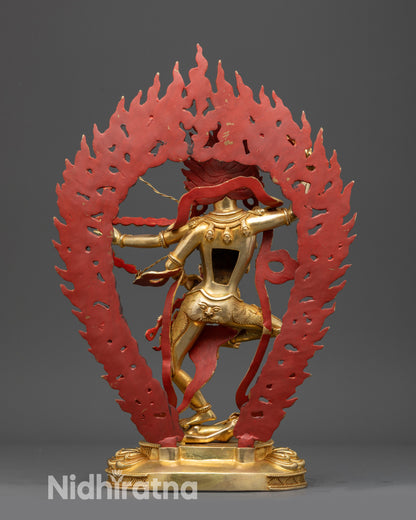 Back view Kurukulla statue highlighting gold fire-gilded body and sacred tantric implements
