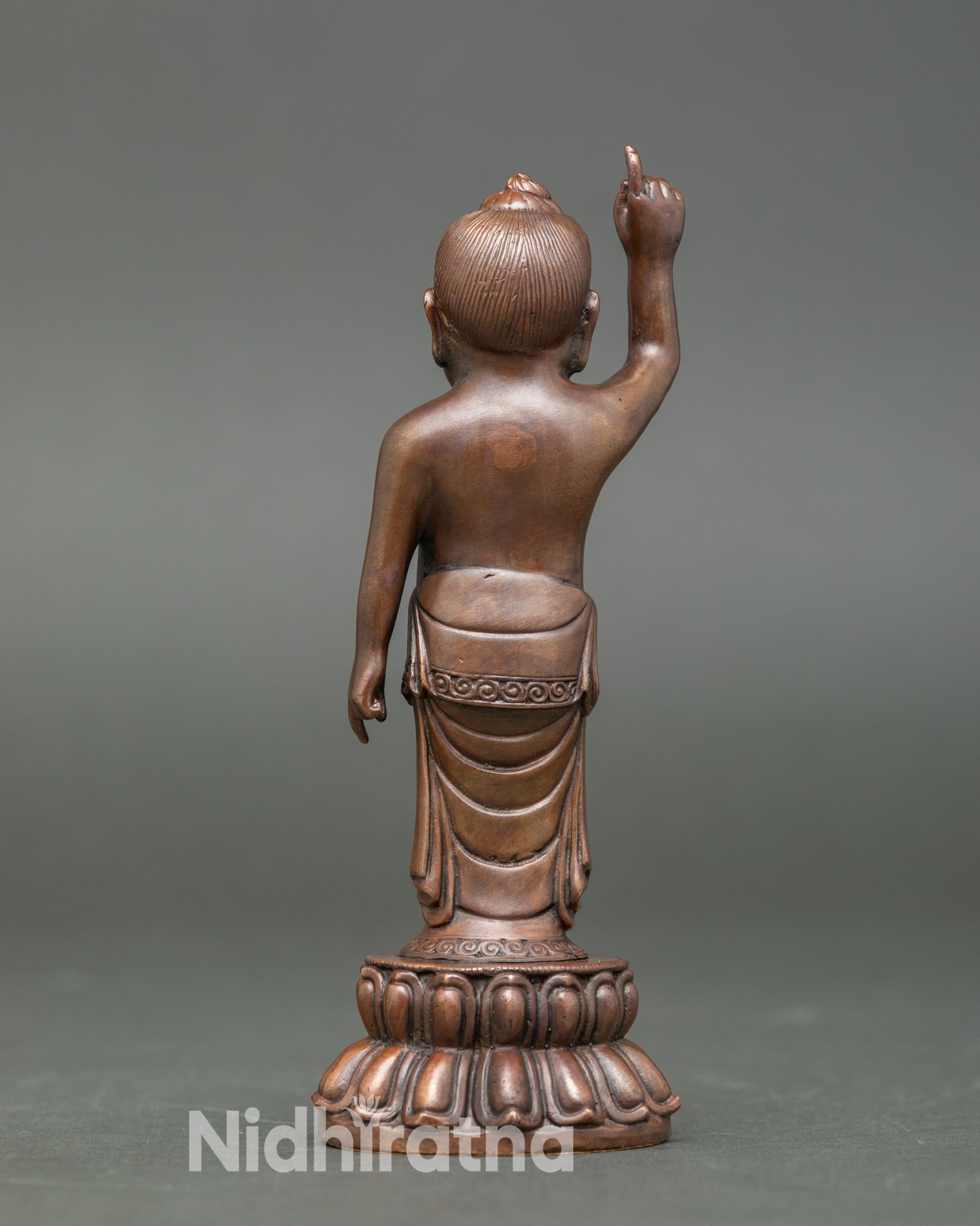 Back view Littel Buddha statue handmade by Newari artisan oxidized copper Buddhist sculpture