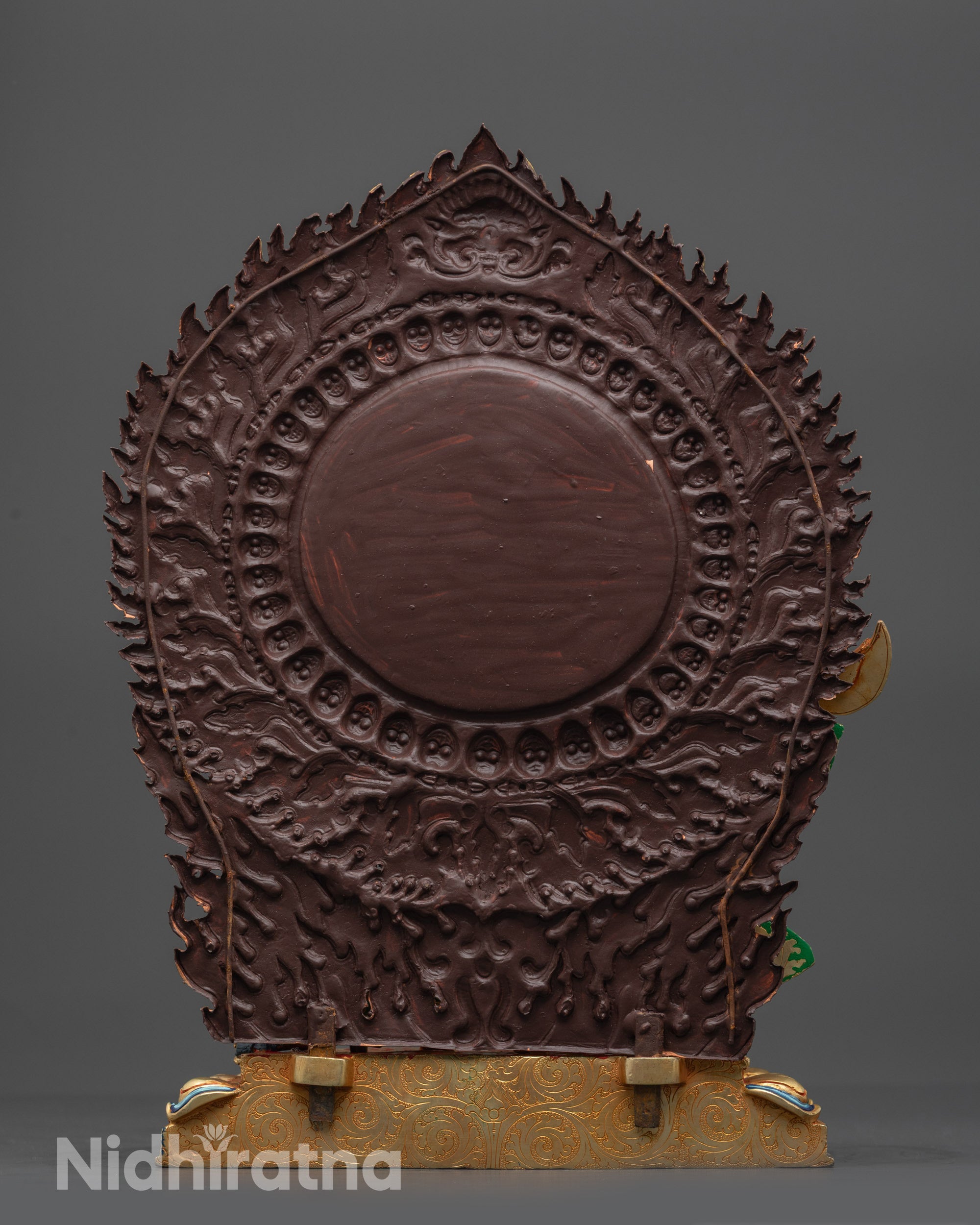 Back view Mahakala Bernagchen Statue showing richly painted robe and vibrant colors