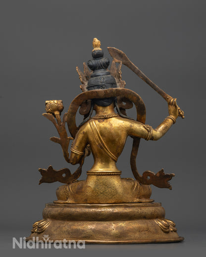 Back view Manjushri Bodhisattva holding utpala flower and double-edged sword with wisdom flame
