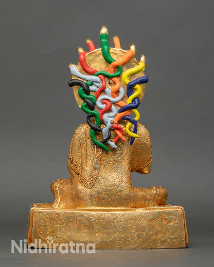 Back view Nagarjun statue colorful serpents radiant halo handcrafted Newari art