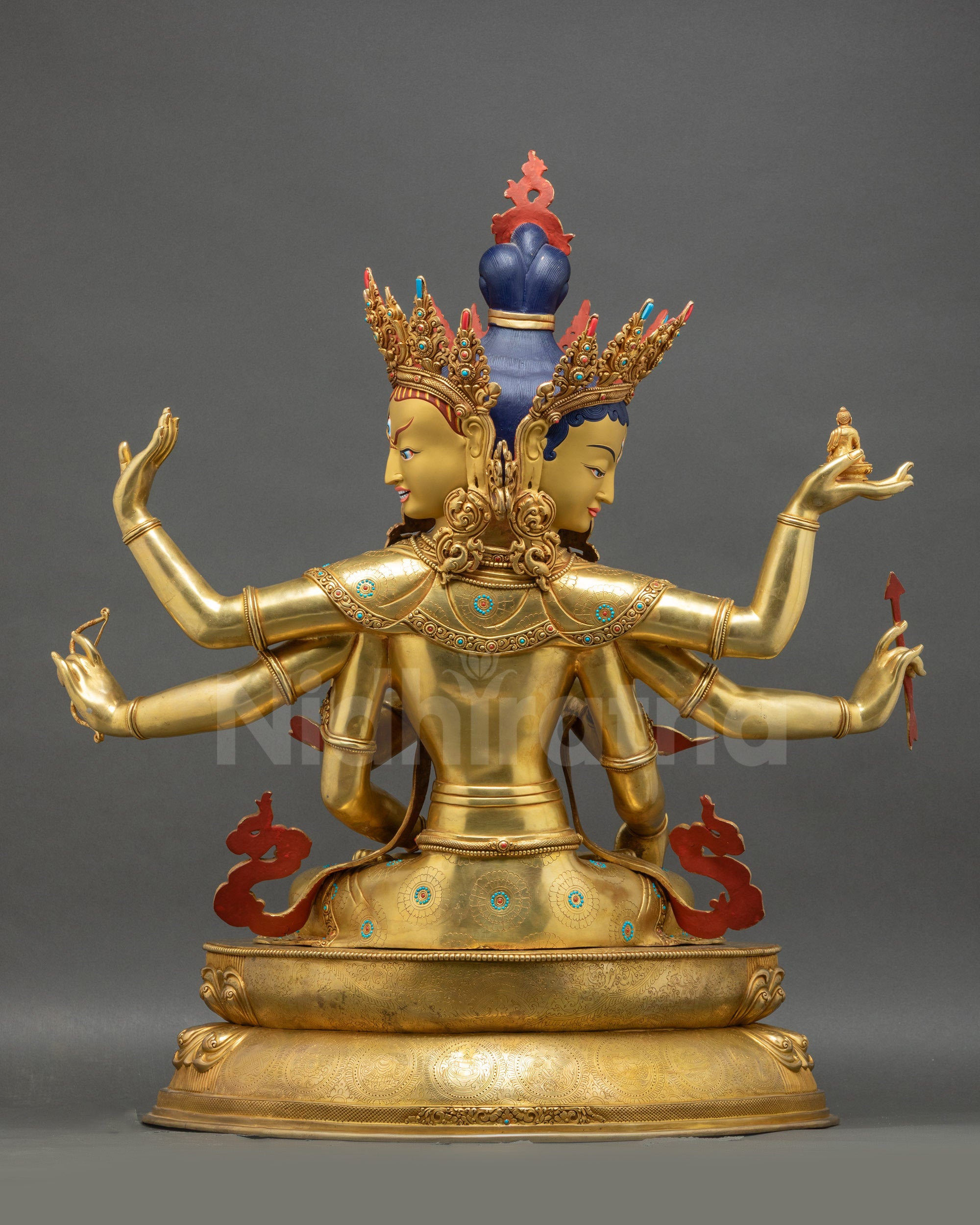 Back view Namgyalma statue with dual deer and dharmachakra carved on lotus base
