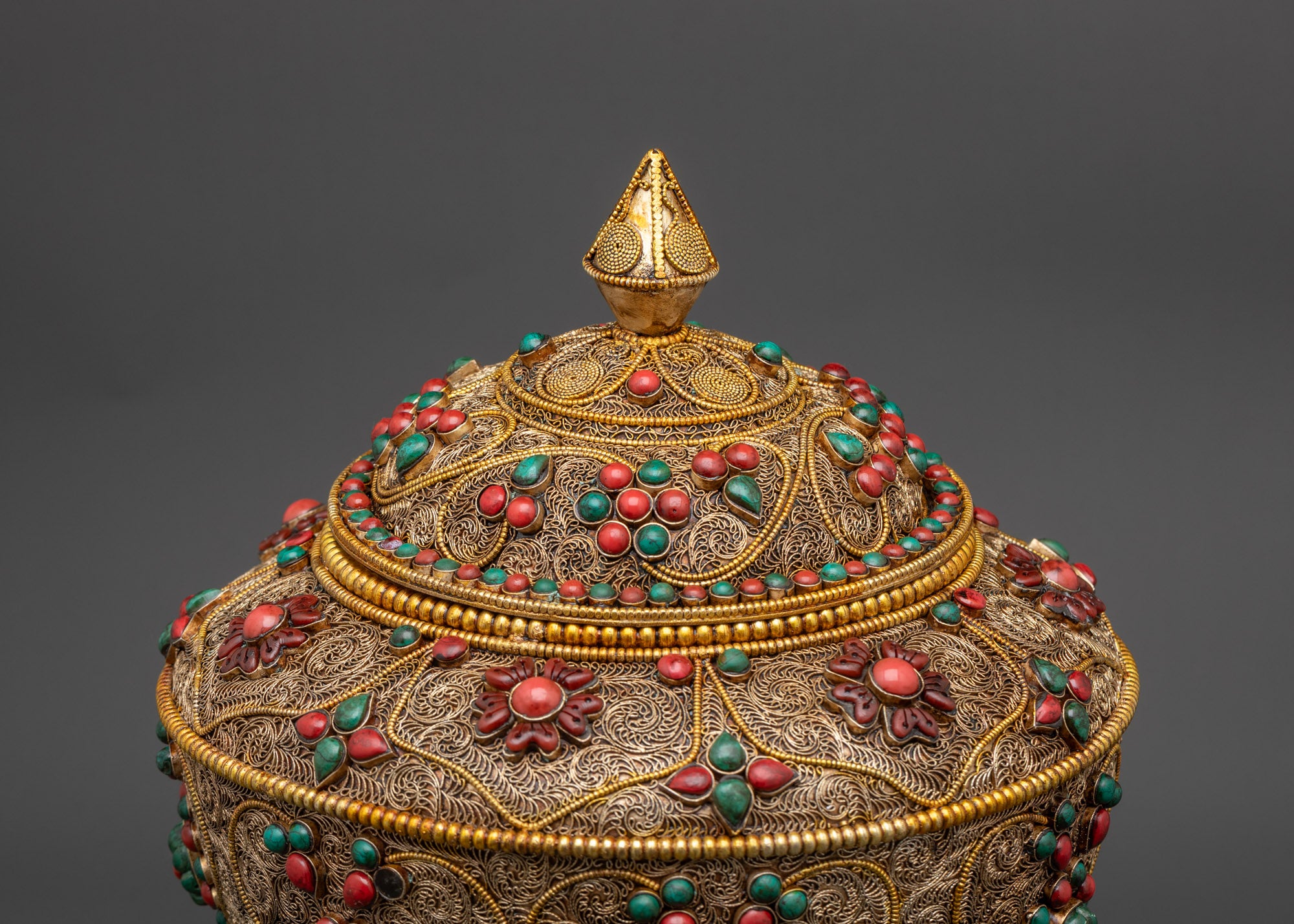Back view Neshi Rice Pot highlighting detailed filigree and sacred Tibetan ritual design