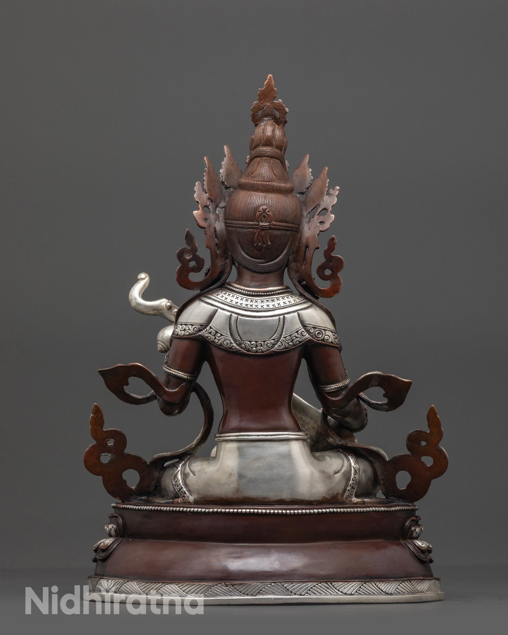 Back view Oxidized Saraswati Statue highlighting double-layered lotus seat and carvings