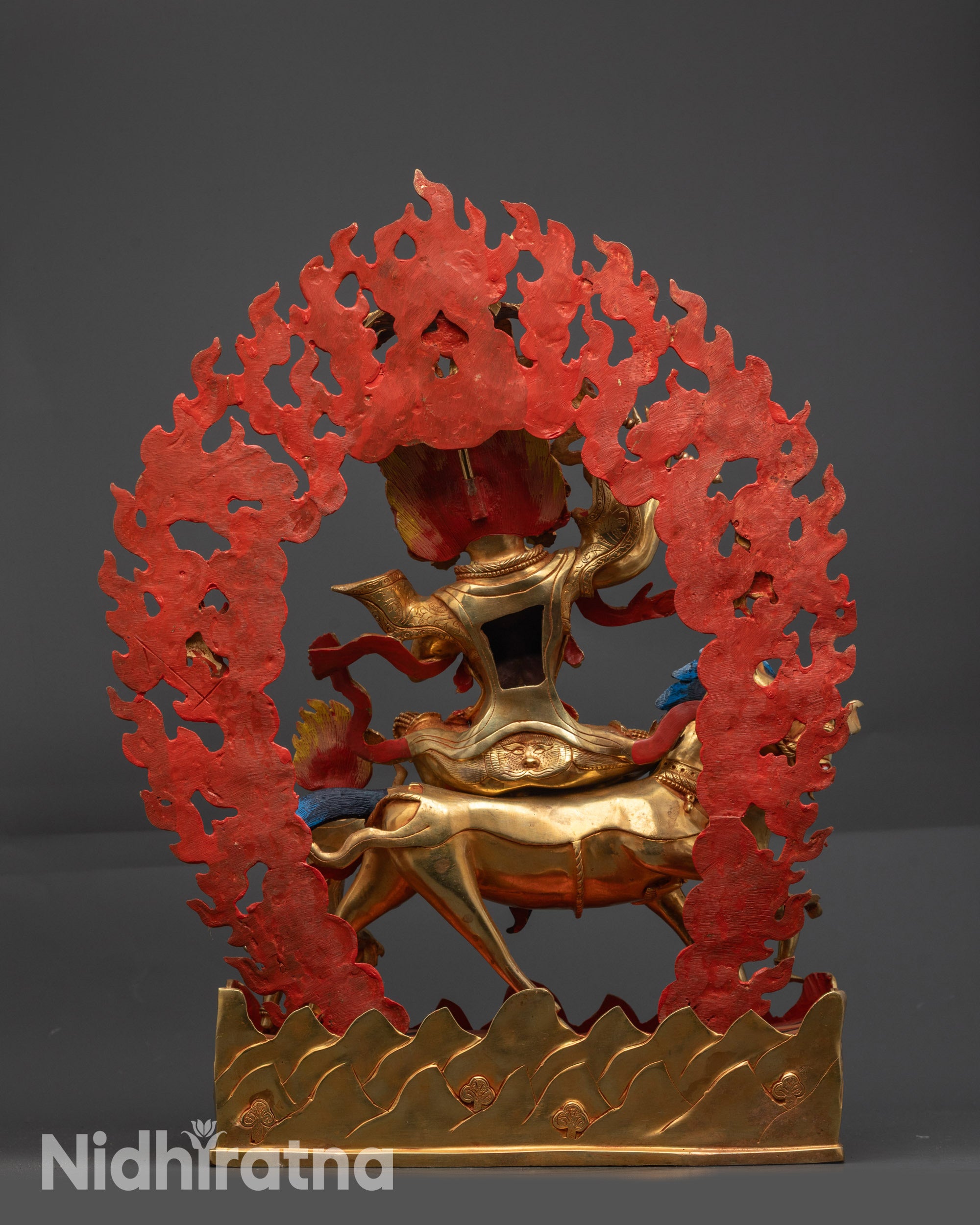Back view Palden Lhamo sculpture featuring blazing halo and detailed carving patterns