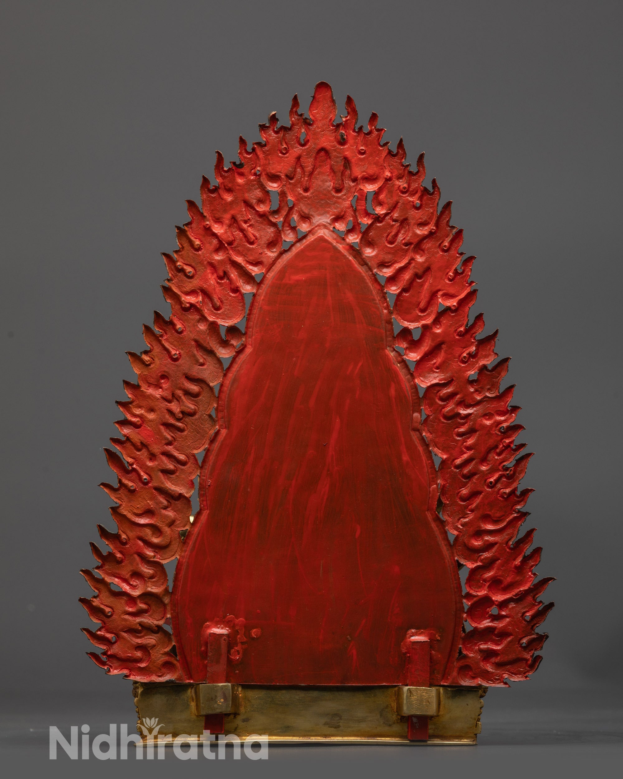 Back view Rahula statue with blazing flame halo and fine details