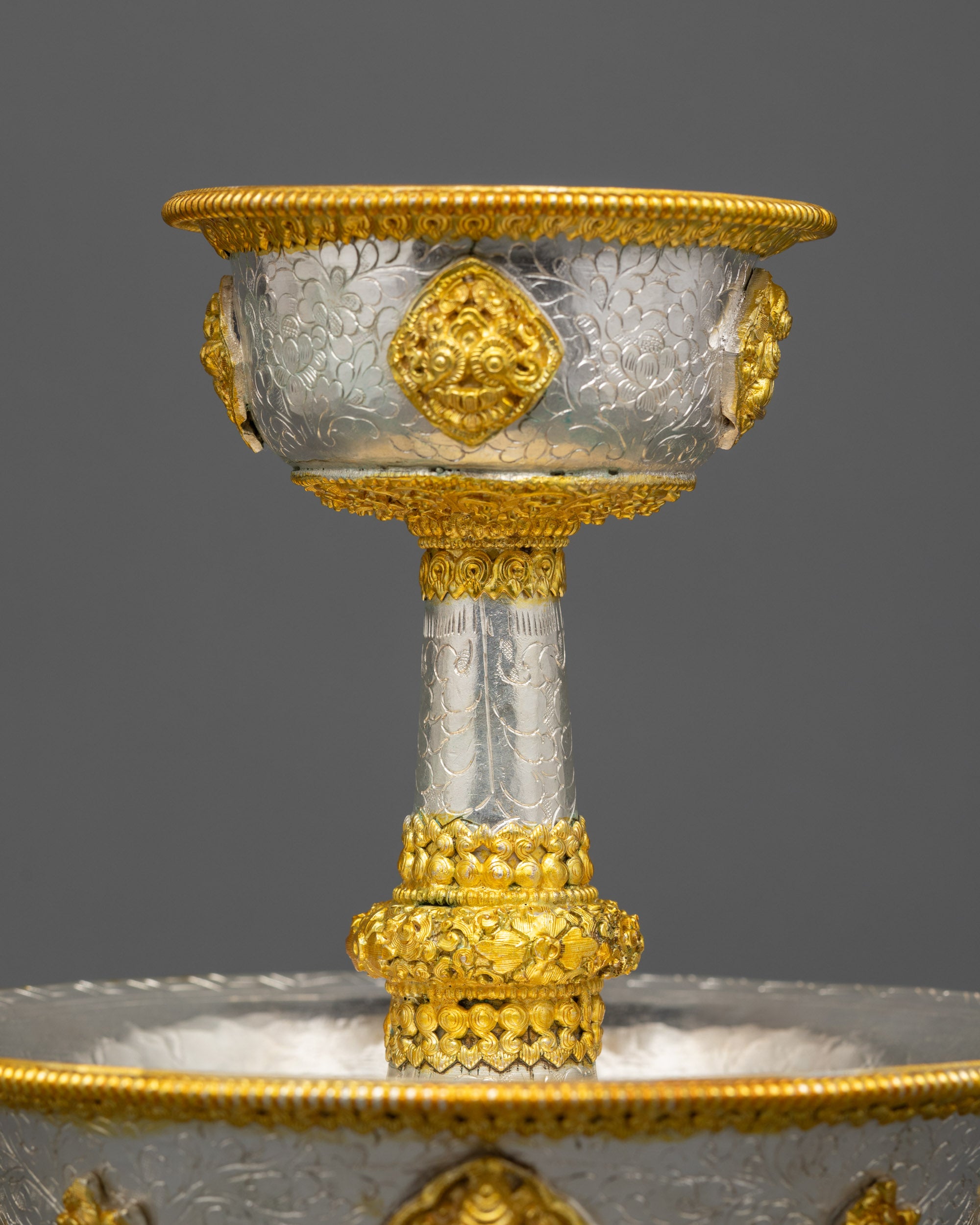 Back view Serkyem Offering Tibetan ritual vessel holding sacred drinks like tea or milk