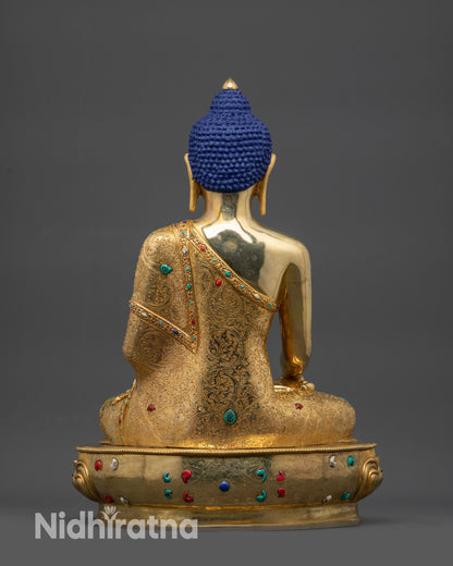 Back view Shakyamuni Buddha Sculpture showing intricate robes and gold fire-gilded body
