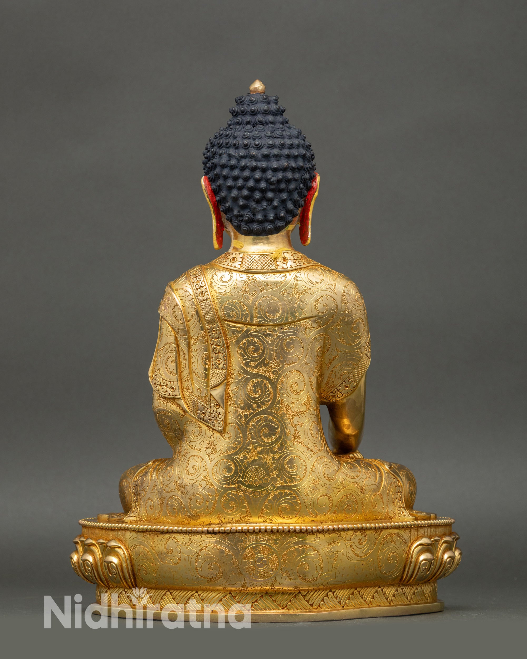 Side view Shakyamuni Buddha statue earth-touching mudra holding patra bowl sacred decor