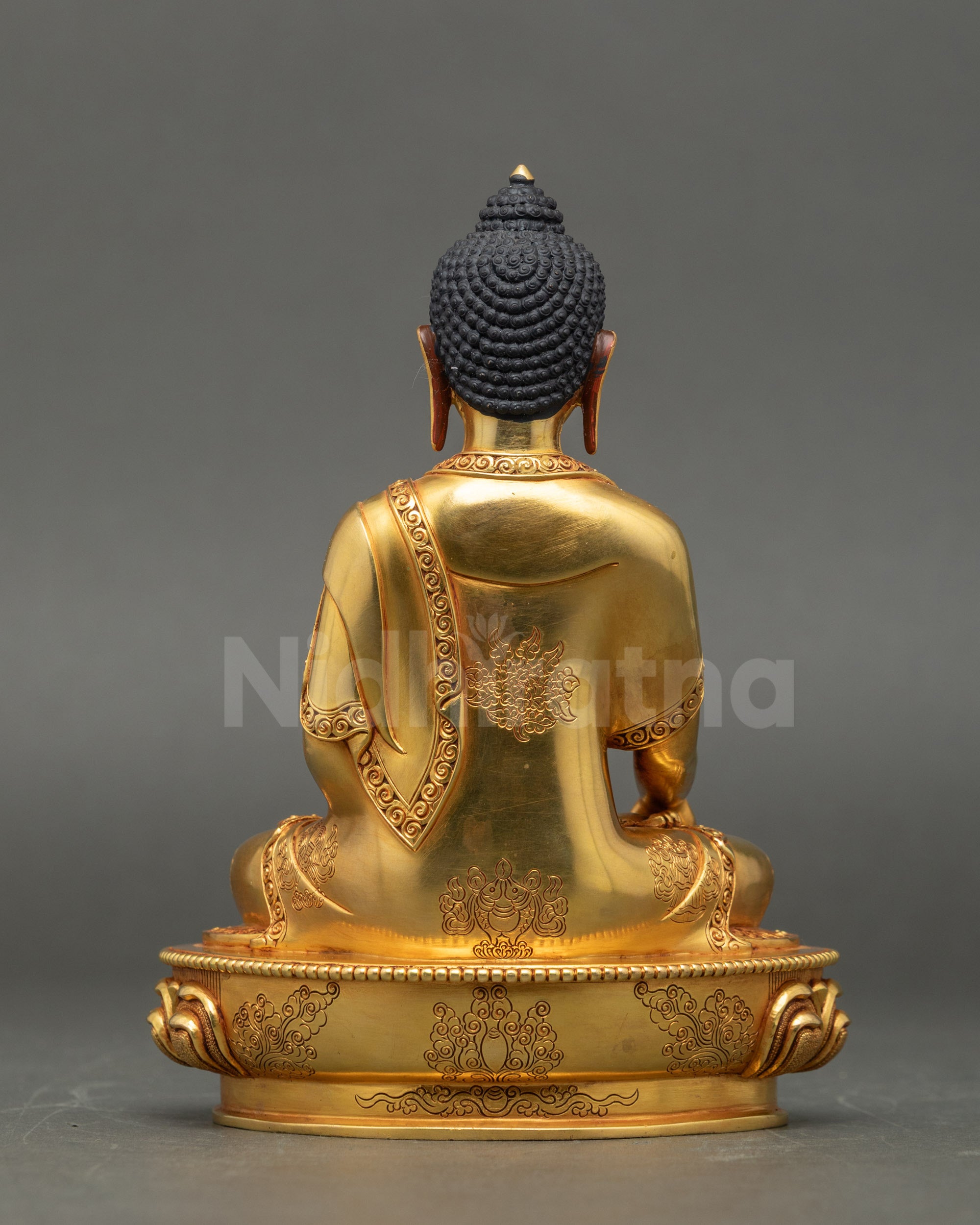 Back view Shakyamuni Buddha statue lotus seat and carved robe Himalayan Buddhist decor