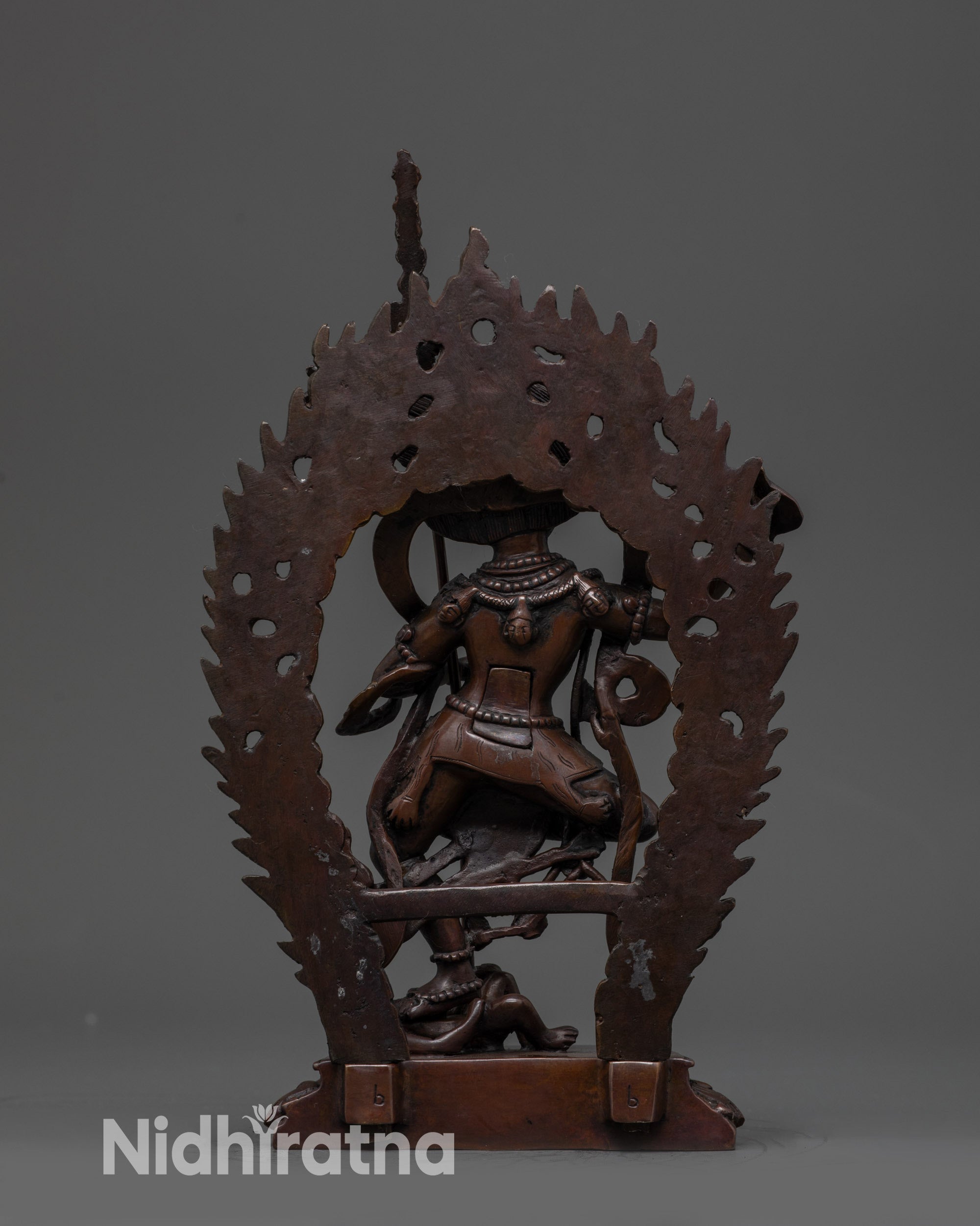 oxidized copper lion-faced dakini